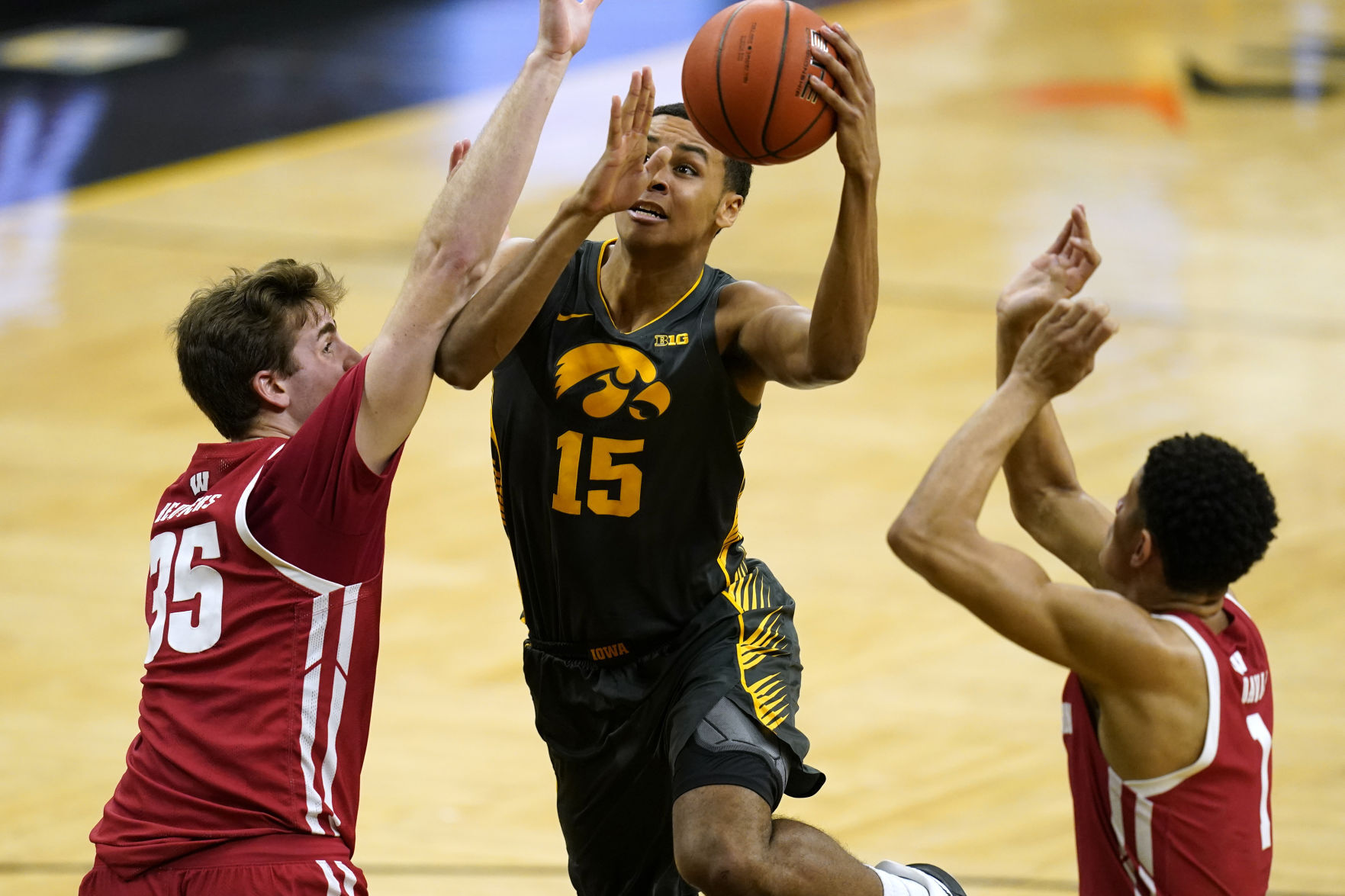 Iowa 77, UW 73